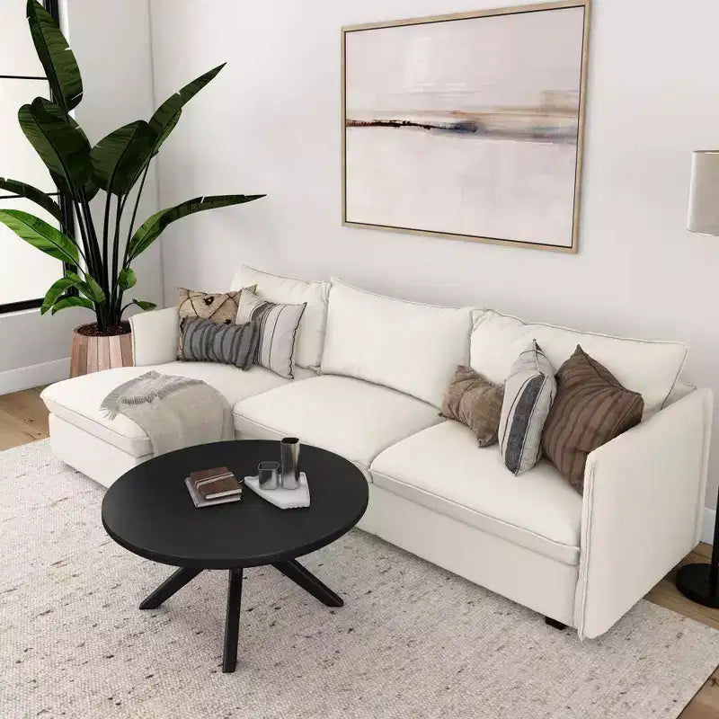 Table basse ronde à pieds croisés en bois massif