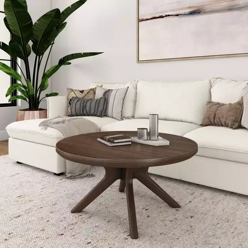 Table basse ronde à pieds croisés en bois massif
